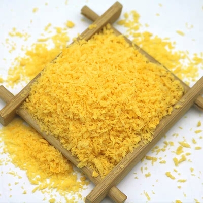 O japonês amarelo crocante friável flocoso Panko lasca-se cheiro cozido do pão