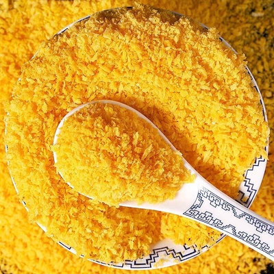 O japonês amarelo crocante friável flocoso Panko lasca-se cheiro cozido do pão
